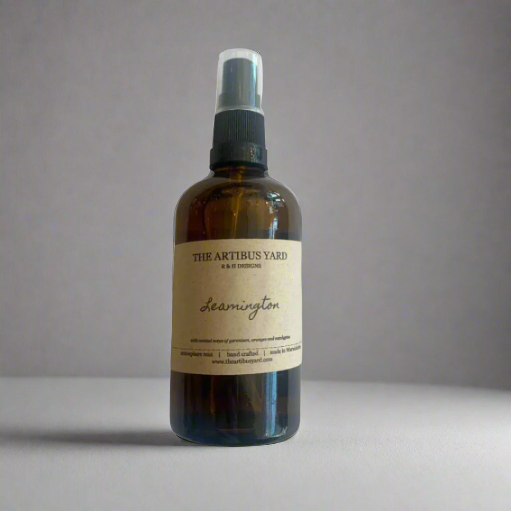 Leamington atmosphere mist by The Artibus Yard, featuring orange, geranium and eucalyptus notes in a sleek spray bottle.