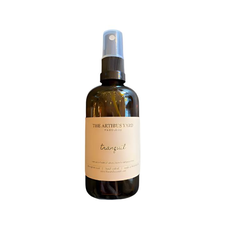 Tranquil atmosphere mist by The Artibus Yard, featuring lavender and peppermint notes in a sleek spray bottle.