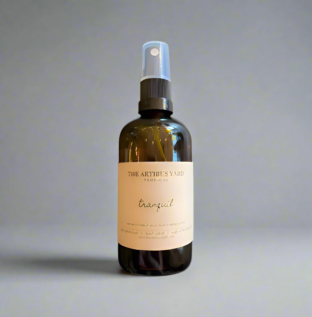 Tranquil atmosphere mist by The Artibus Yard, featuring lavender and peppermint notes in a sleek spray bottle.