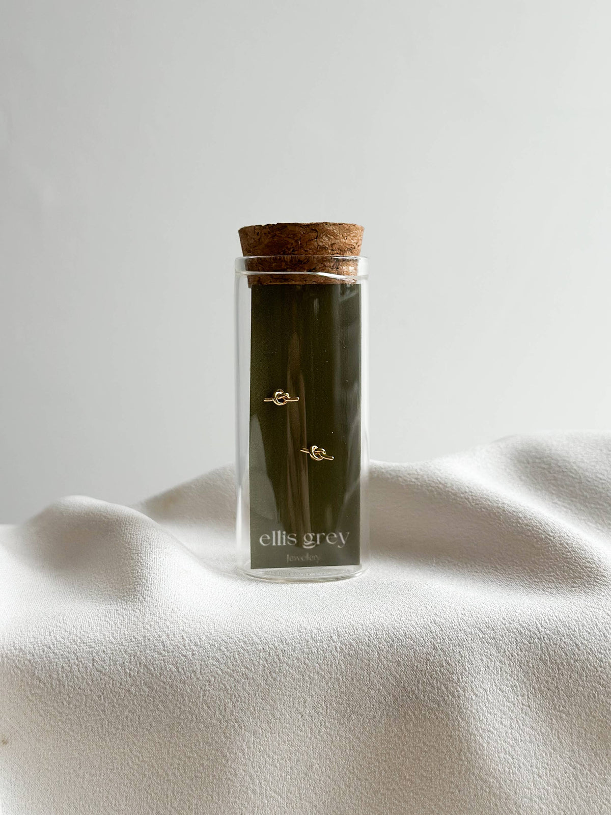 Gold Knot Stud Earrings | Glass Vial