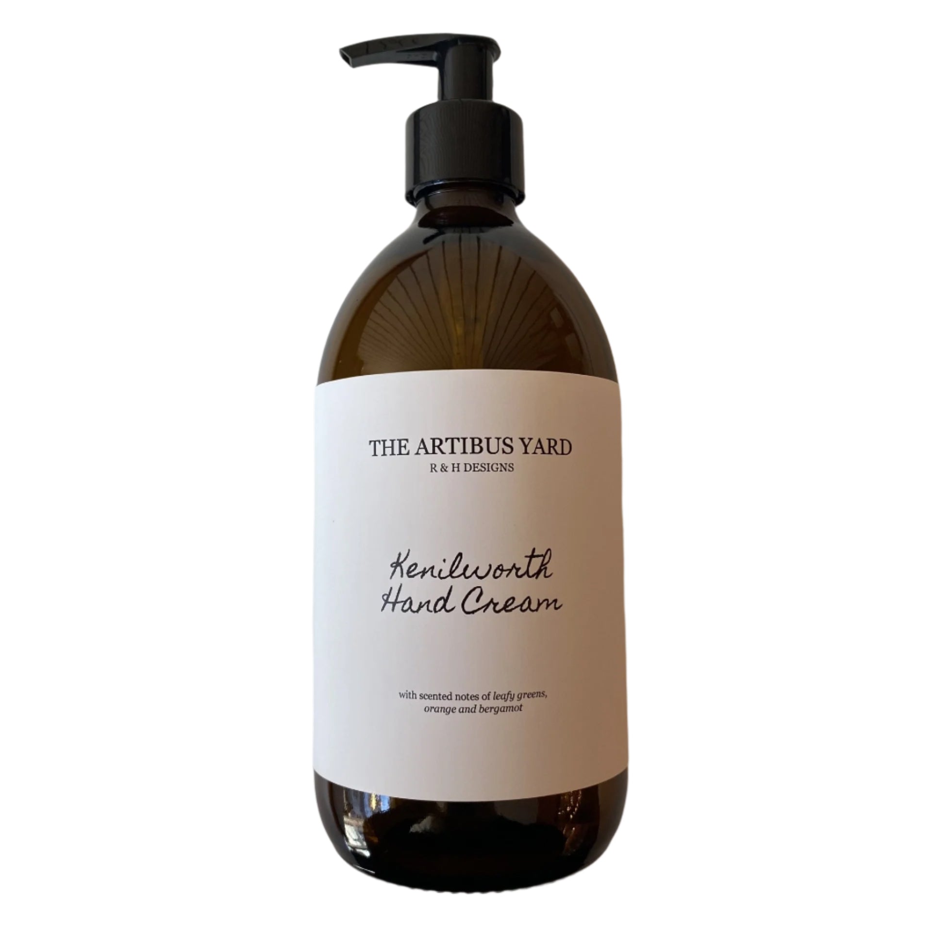 Kenilworth scented hand cream by The Artibus Yard, enriched with nourishing ingredients and leafy and citrus notes, packaged in an amber glass bottle with pump dispenser. 