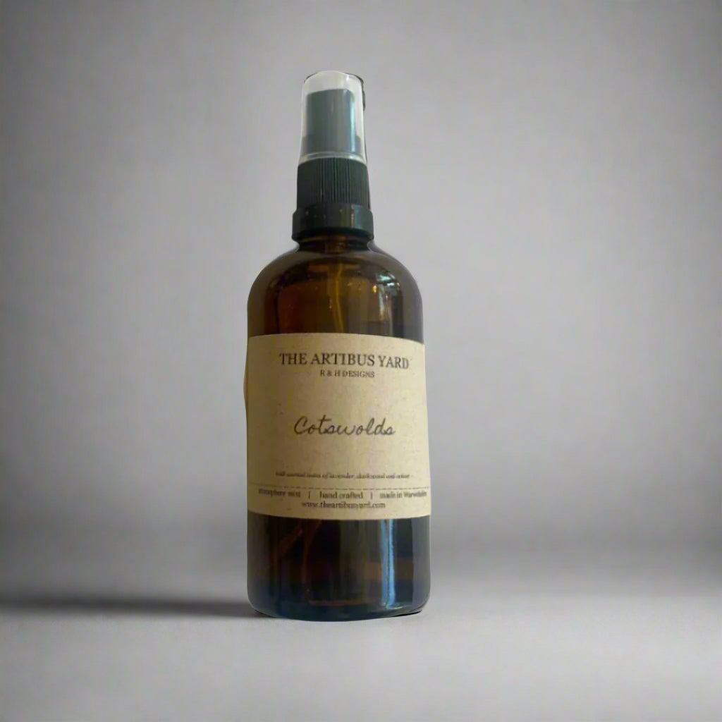 Cotswolds atmosphere mist by The Artibus Yard, featuring lavender, dark wood and vetiver notes in a sleek spray bottle.