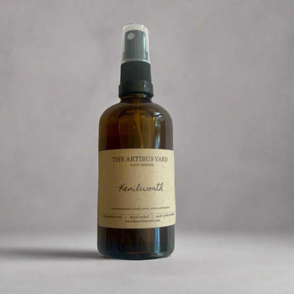 Kenilworth atmosphere mist by The Artibus Yard, featuring fresh leafy greens, orange, and bergamot notes in a sleek spray bottle.